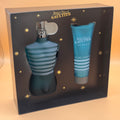 Jean Paul Gaultier perfume set in packaging with a blue striped bottle and shower gel.
