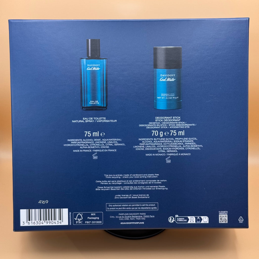 Back view of a Davidoff Cool Water men's perfume and deodorant set packaging on a beige background.