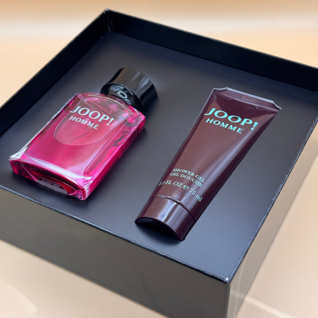 Joop! Homme perfume and shower gel on a black tray