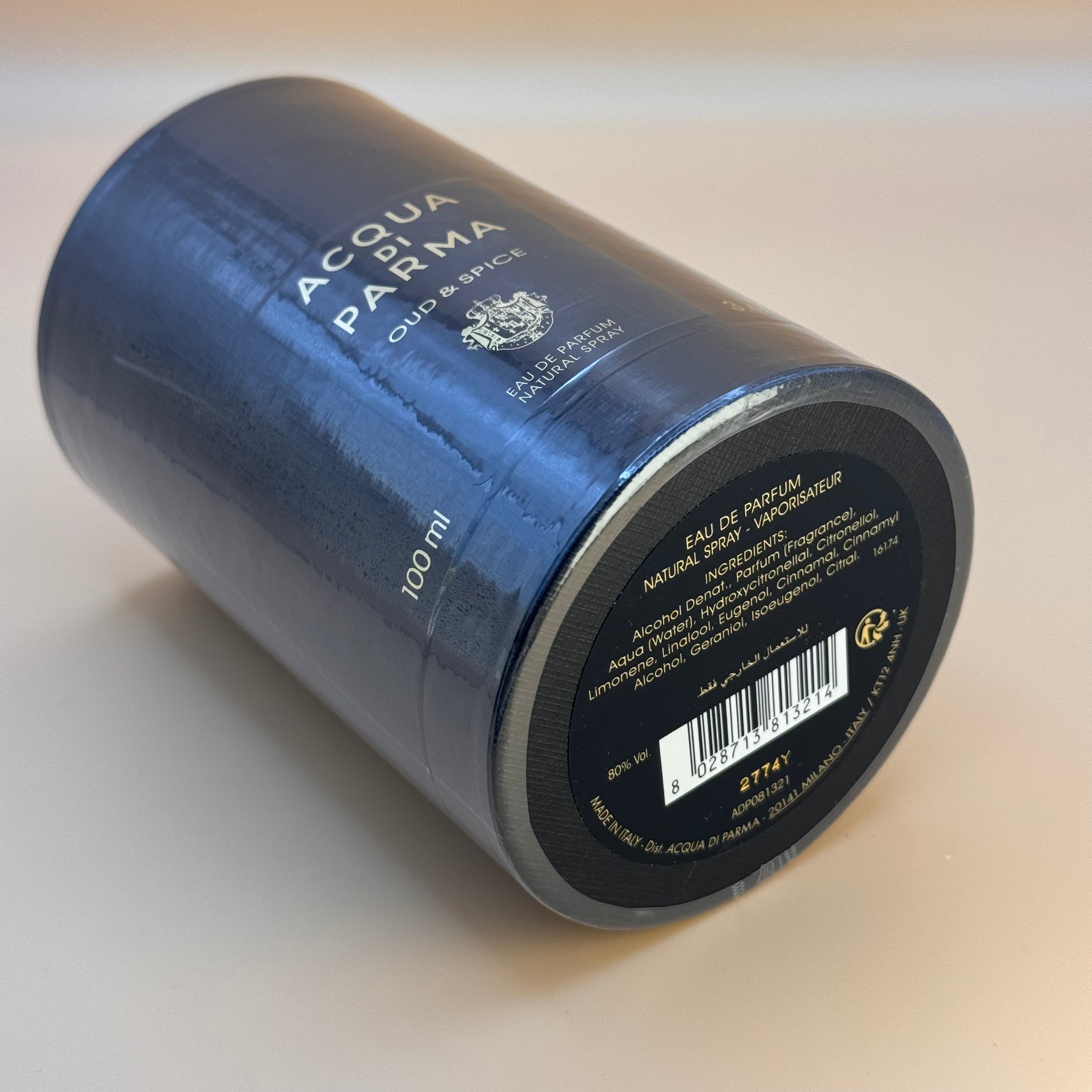 Blue Acqua Parma Oud & Spice perfume bottle on a light background