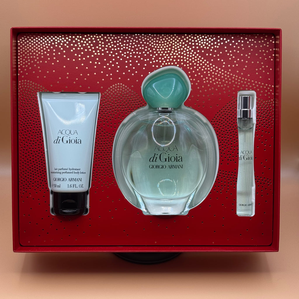 Perfume set with 'Acqua di Gioia' by Giorgio Armani in a red box.
