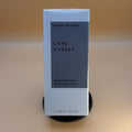 Issey Miyake L'Eau D'Issey deodorant spray packaging on a beige background