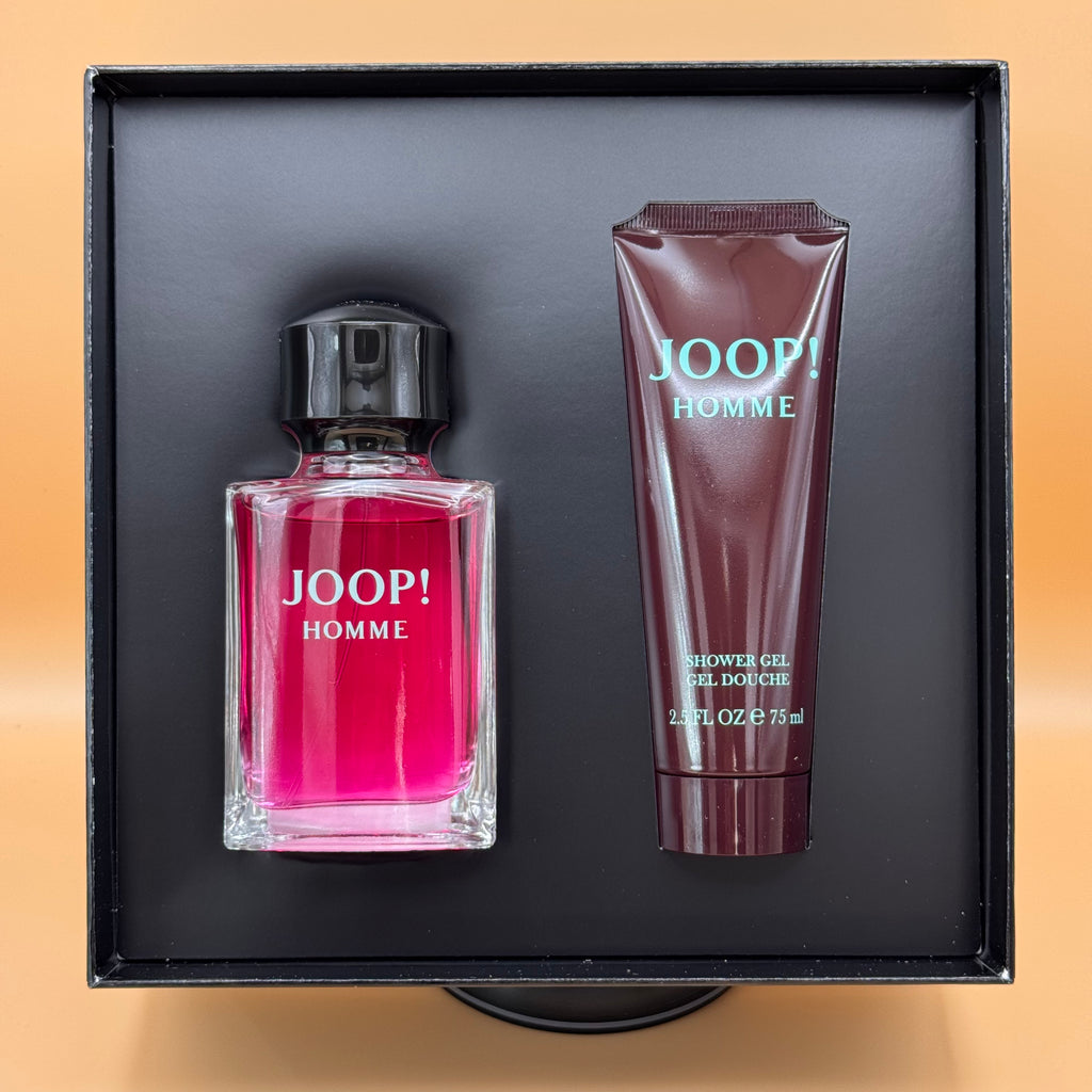 JOOP! Homme perfume bottle and shower gel in a black box on a beige background