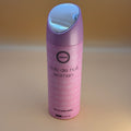 Pink Armaf Club de Nuit for Woman body spray bottle on a beige background
